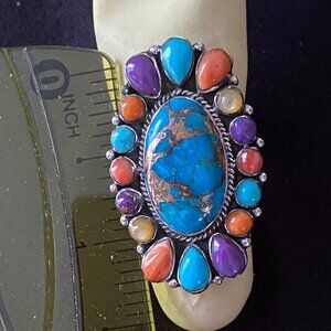 Sterling Silver 925 Ring.  Turquoise with matrix stone surrounded by 16 stones.